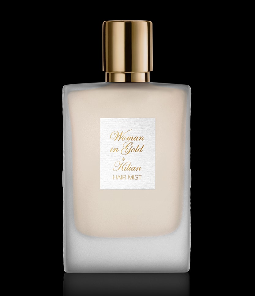 Woman in Gold Hair Mist